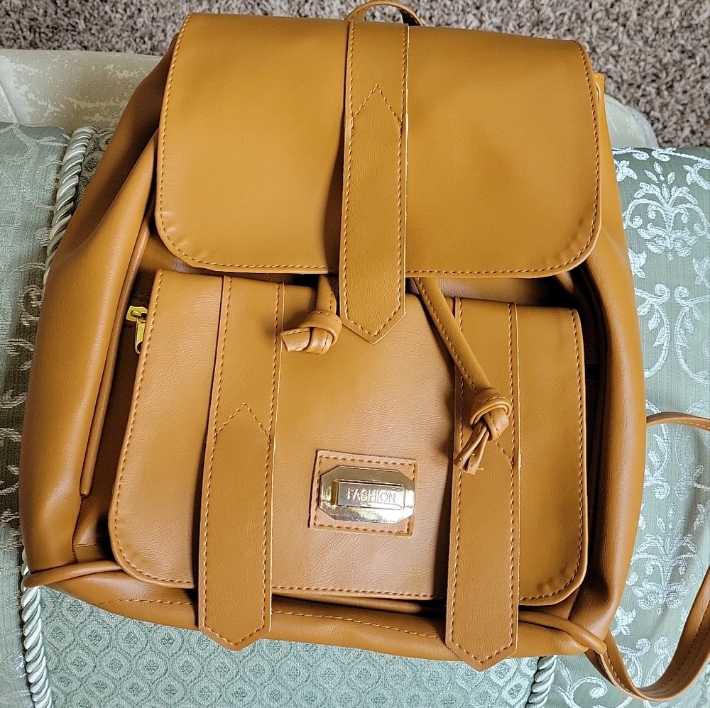 Fashion backpack. Light brown- medium size. Made in Colombia